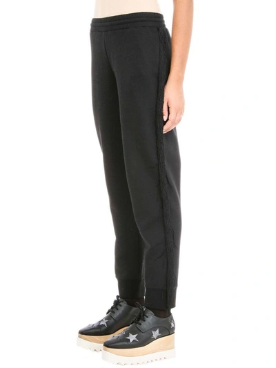 Shop Stella Mccartney Fringe-trimmed Trousers In Black
