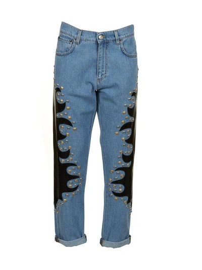 Shop Moschino Studded Jeans In Denim