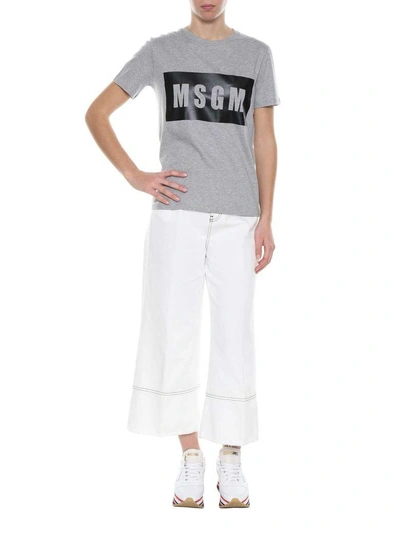 Shop Msgm Cropped Wide-leg Jeans In Bianco