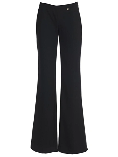 Shop Versace Trousers In Gnero