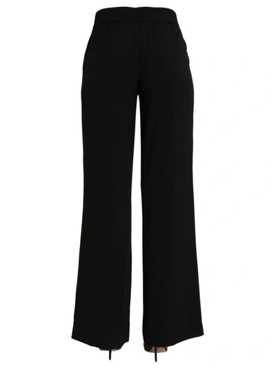 Shop Boutique Moschino Wide Trousers In Nero