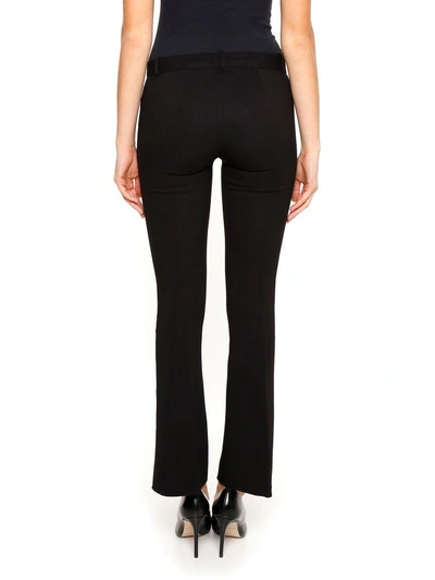 Shop Versace Cady Trousers In Nero