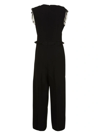 Shop Red Valentino Ruffled Front Jumpsuit In Nero