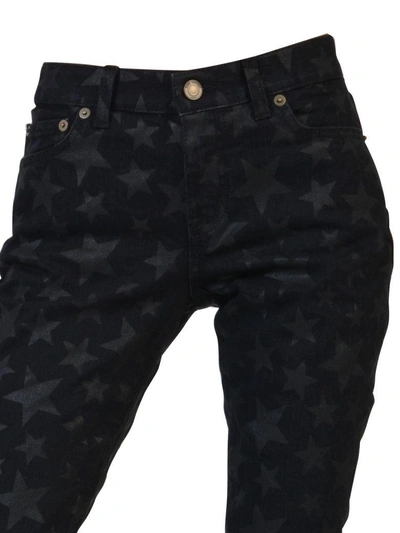 Shop Saint Laurent Printed-stars Skinny Jeans In Black