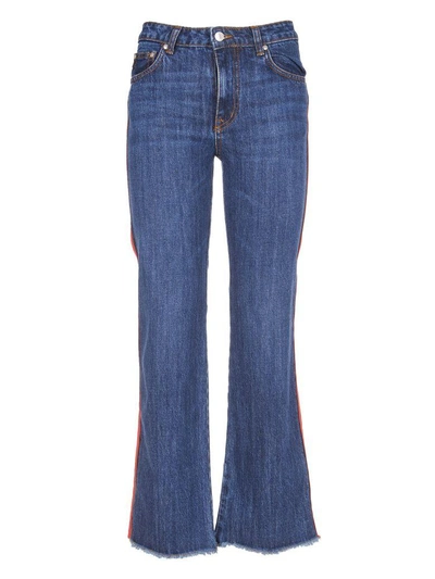 Shop Msgm Flared Jeans In Denim