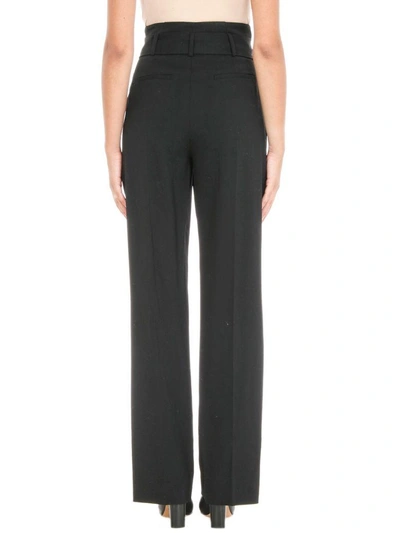 Shop Iro Belted Wide-leg Trousers In Black