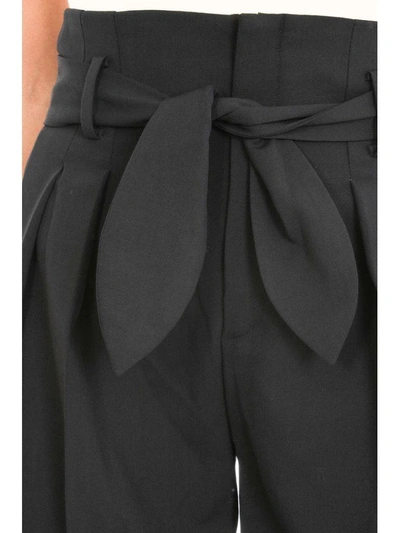 Shop Iro Belted Wide-leg Trousers In Black