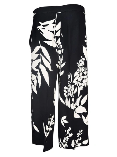 Shop Rochas Floral Print Cropped Trousers In Nero