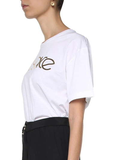 Shop Versace Vintage Logo-print Cotton-jersey T-shirt In Bianco