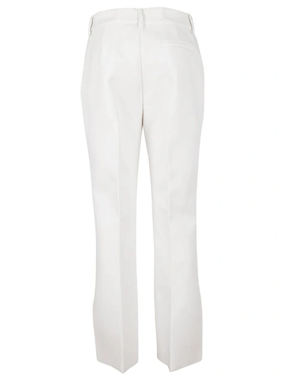 Shop Msgm Double-crepe Flared Pants In Bianco