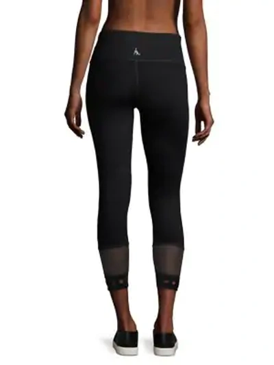 Shop Nancy Rose Performance Billie Eyelet Mesh Hem Cropped Leggings In Black