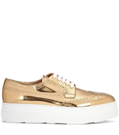 Shop Prada Metallic Leather Platform Sneakers In Gold