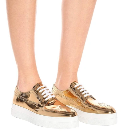 Shop Prada Metallic Leather Platform Sneakers In Gold