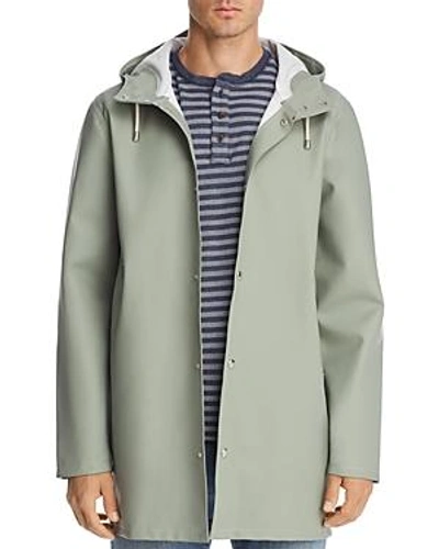 Shop Stutterheim Stockholm Hooded Raincoat In Khaki Green