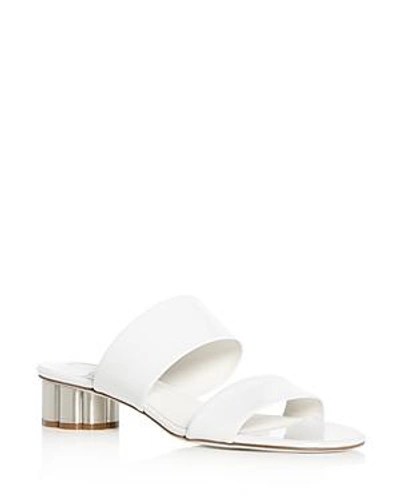 Shop Ferragamo Patent Leather Floral Heel Slide Sandals In New Bianco White