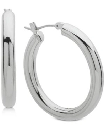 Shop Dkny 1 1/5" Thick Hoop Earrings In Silver