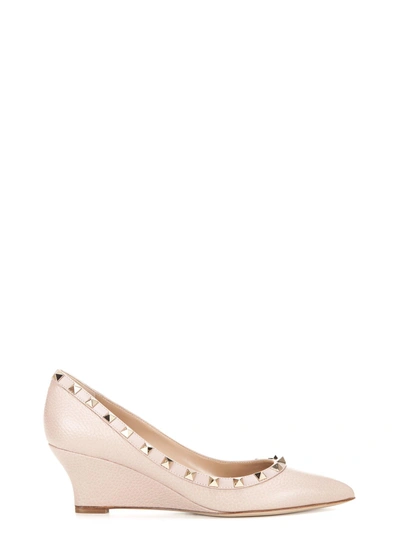 Shop Valentino Rockstud Wedge Pumps In Nude & Neutrals