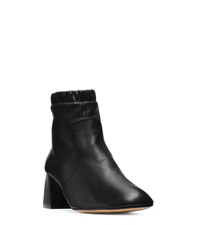 Shop Stuart Weitzman The Tabbi Bootie In Black Matte Leather