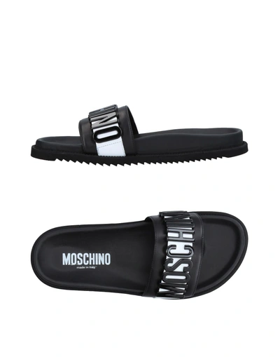 Shop Moschino Sandals In Black