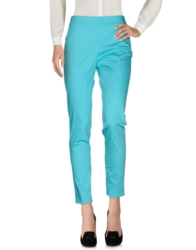 Shop Moschino Pants In Turquoise