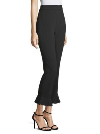 Shop Josie Natori Crepe Ruffle-hem Pants In Black