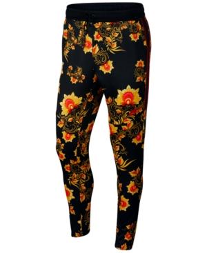 yellow nike track pants