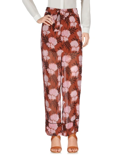 Shop Ganni Casual Pants In Brown