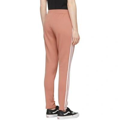 Shop Adidas Originals Pink Sst Track Pants In Ash Pink