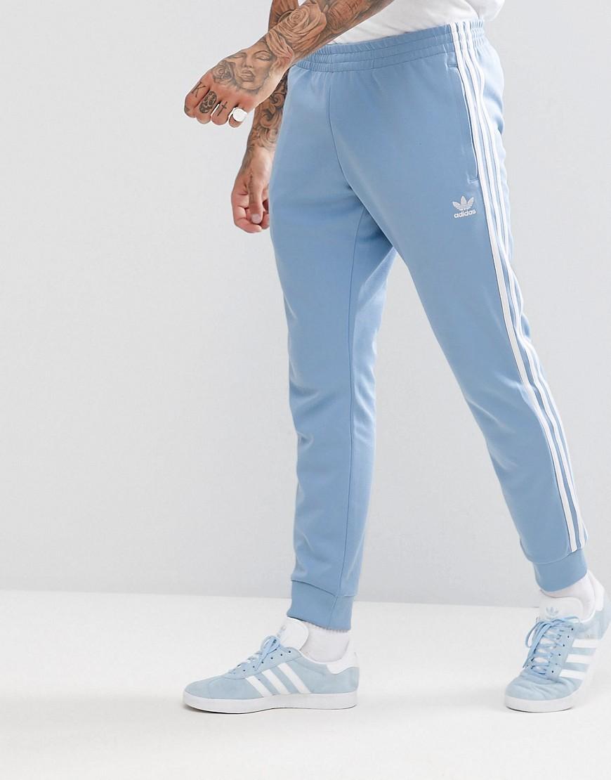 teal adidas sweatpants