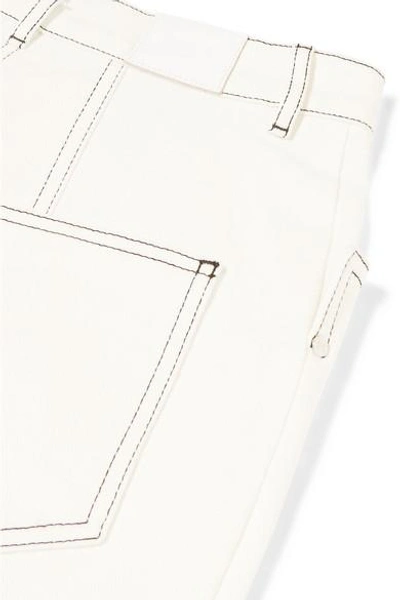 Shop Mugler Cropped High-rise Bootcut Jeans In White