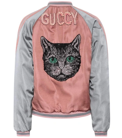 Gucci Tiger Face Embroidered Bomber Jacket, $2,338, farfetch.com