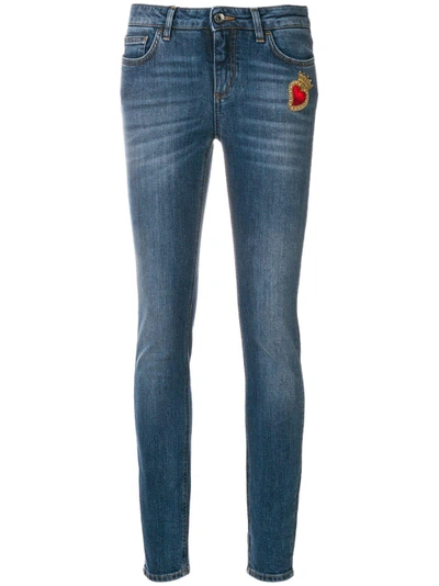 Shop Dolce & Gabbana Sacred Heart Patch Skinny Jeans