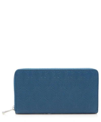 Shop Liberty London Large Zip Around Wallet In Iphis Embossed Leather In Blue