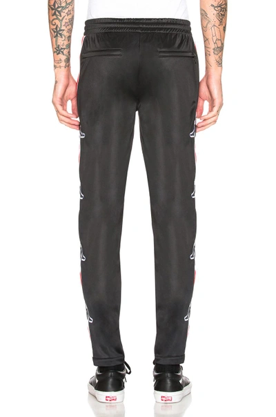 Shop Marcelo Burlon County Of Milan Marcelo Burlon X Kappa Stripe Pants In Black