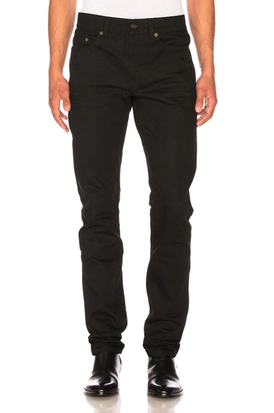 Shop Saint Laurent Low Rise Skinny Jeans In Black