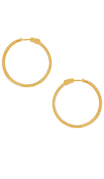 Shop The M Jewelers Ny The Thin Pave Hoops In Metallic Gold.