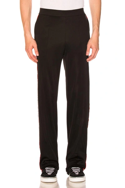 Shop Givenchy Tape Logo Sweatpants In Black