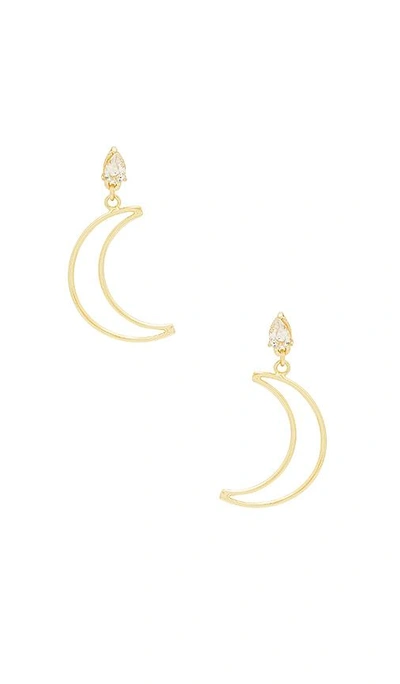Shop Shashi Crescent Drop Earrings In Metallic Gold