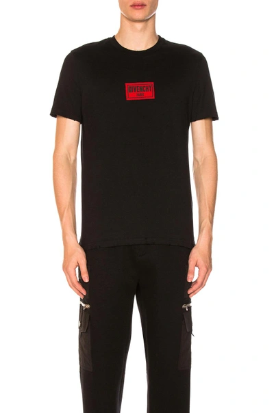 Shop Givenchy Distressed Logo T-shirt In Black