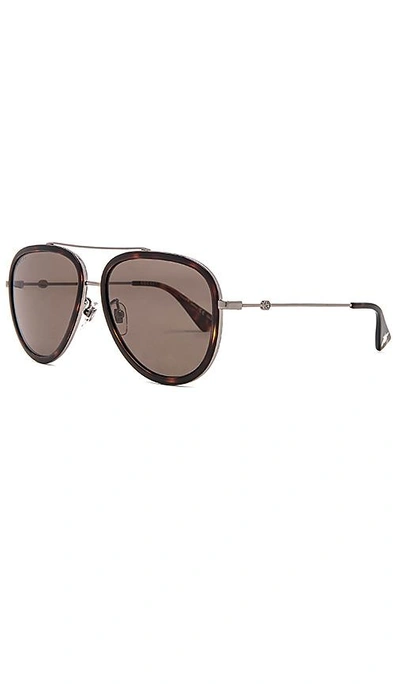 Shop Gucci Aviator In Brown