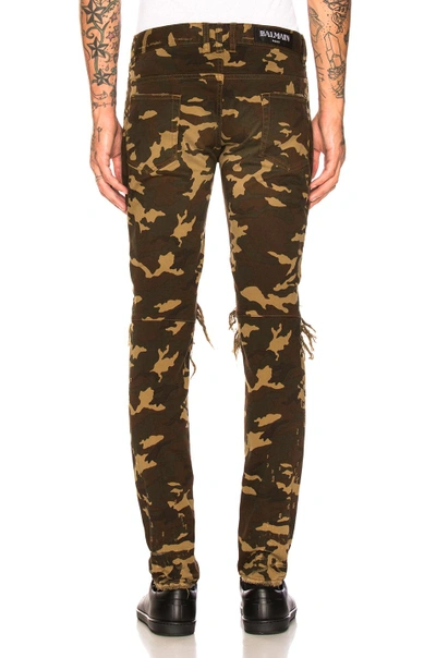 Shop Balmain Camouflage Destroyed Jeans In Brown,green