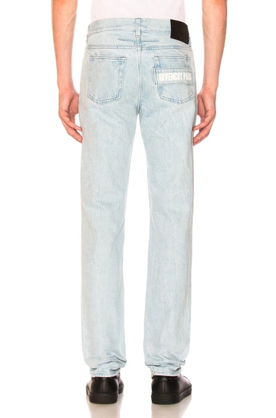 Shop Givenchy Embroidered Pocket Jeans In Blue