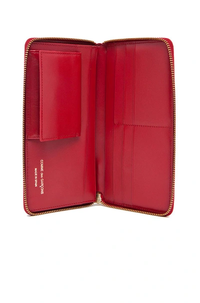 Shop Comme Des Garçons Star Embossed Long Wallet In Red