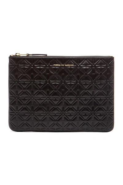 Comme Des Garçons Comme Des Garcons Star Embossed Pouch In Black, Geometric Print.