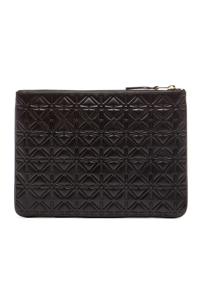 Comme Des Garçons Comme Des Garcons Star Embossed Pouch In Black, Geometric Print.