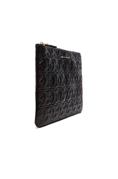 Comme Des Garçons Comme Des Garcons Star Embossed Pouch In Black, Geometric Print.