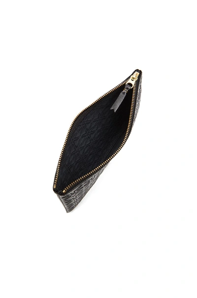 Comme Des Garçons Comme Des Garcons Star Embossed Pouch In Black, Geometric Print.