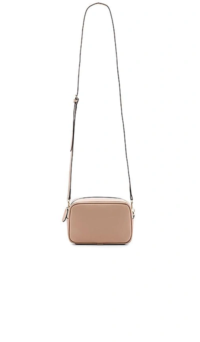 Shop The Daily Edited Mini Cross Body Bag In Taupe