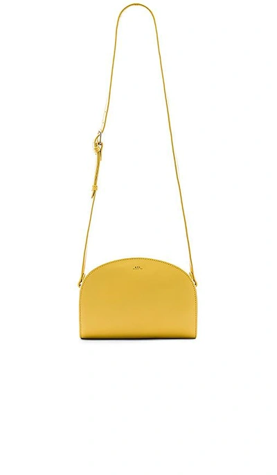 Shop Apc Sac Demi Lune Bag In Yellow