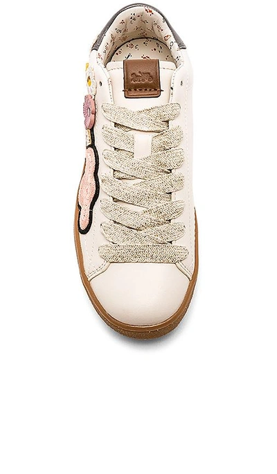Shop Coach Cloud Patches Sneaker In Ivory